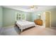 Bedroom with neutral walls, carpet flooring, a large window and minimalist decor at 24 Sunrise Pl, Durham, NC 27705