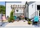 Charming backyard patio area with pergola, string lights, and comfortable seating at 2805 Fayetteville St, Durham, NC 27707