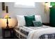 Closeup of the bed with pillows and cozy bedding at 2805 Fayetteville St, Durham, NC 27707