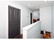 Upper hallway with a closet and access to various rooms at 2805 Fayetteville St, Durham, NC 27707