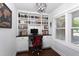 Bright office with custom built-ins, desk, and large window at 2805 Fayetteville St, Durham, NC 27707