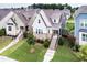 Aerial view of well-manicured lawns highlighting the neighborhood's attractive home exteriors at 2837 Milano Ave, Apex, NC 27502
