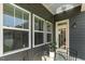 The home's back porch has a glass table and chairs for outdoor seating at 2837 Milano Ave, Apex, NC 27502