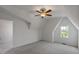 This bedroom features neutral walls, carpet flooring, a ceiling fan, and natural lighting at 2837 Milano Ave, Apex, NC 27502