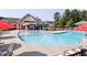 Resort style community pool with splash pad and plenty of room for lounging at 2837 Milano Ave, Apex, NC 27502