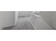 This hallway features neutral paint, carpet flooring, and white trim at 2837 Milano Ave, Apex, NC 27502