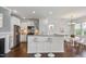 Kitchen with granite counters, stainless steel appliances, and breakfast bar at 2837 Milano Ave, Apex, NC 27502