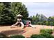 Colorful community playground with multiple slides, climbing areas, and swings, perfect for outdoor fun at 2837 Milano Ave, Apex, NC 27502