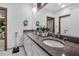 Bathroom with double sinks, tile flooring, and lots of storage at 289 Stoneview, Pittsboro, NC 27312
