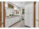 Elegant bathroom with double vanity, granite countertops, and natural wood trim at 289 Stoneview, Pittsboro, NC 27312