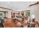 Bright open-concept living room with hardwood floors and natural light at 289 Stoneview, Pittsboro, NC 27312