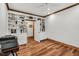 Office space featuring custom built-in shelves, wood floors, and natural light at 289 Stoneview, Pittsboro, NC 27312