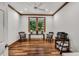 Office space featuring wood floors, natural light, and serene wooded views at 289 Stoneview, Pittsboro, NC 27312