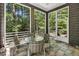 Cozy screened porch featuring views of the surrounding nature at 289 Stoneview, Pittsboro, NC 27312