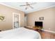 Bedroom features hardwood floors, neutral paint and access to a private bathroom at 3 Bent Oak Ct, Durham, NC 27705