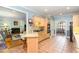 Open kitchen with granite countertops connecting dining and living room at 3 Bent Oak Ct, Durham, NC 27705