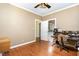 Office includes hardwood floors, neutral wall colors, a ceiling fan and direct access to a full bathroom at 3 Bent Oak Ct, Durham, NC 27705