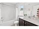 Clean bathroom with combination tub and shower, complemented by a sleek vanity at 309 S Haywood St St, Raleigh, NC 27601