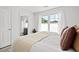 Comfortable bedroom with a view into the ensuite bathroom and natural light at 309 S Haywood St St, Raleigh, NC 27601