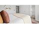 Bright bedroom featuring a large window and an ensuite bathroom at 309 S Haywood St St, Raleigh, NC 27601