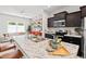 Open concept kitchen with granite countertop and stainless appliances at 309 S Haywood St St, Raleigh, NC 27601