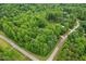 Overhead aerial view showing the house and surroundings at 31 River View Ct, Timberlake, NC 27583