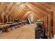 Spacious attic area with plywood flooring and exposed beams, great for storage at 31 River View Ct, Timberlake, NC 27583