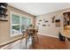 Inviting dining area with natural light, providing serene views of the outdoors at 31 River View Ct, Timberlake, NC 27583
