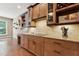 Stylish kitchen featuring granite countertops, custom cabinets, and modern appliances at 31 River View Ct, Timberlake, NC 27583