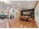 Spacious open-concept living and dining area with beautiful hardwood floors and great natural light at 31 River View Ct, Timberlake, NC 27583