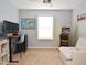Bedroom setup for an office and gaming with natural light and neutral paint at 312 Crusaders Dr, Morrisville, NC 27560