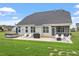 Large backyard featuring a patio, outdoor seating, a grill and a hot tub at 337 Brinkley Cir, Mebane, NC 27302