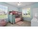 Charming bedroom featuring bunk beds, playful decor, and plenty of natural light at 337 Brinkley Cir, Mebane, NC 27302