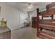Bedroom featuring a wooden bunk bed, neutral walls, and a ceiling fan at 3400 Secretariat Way, Raleigh, NC 27614