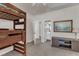 Bedroom featuring a wooden bunk bed, neutral walls, and ensuite bath at 3400 Secretariat Way, Raleigh, NC 27614
