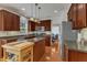 Well-equipped kitchen featuring stainless steel appliances, granite countertops, and ample cabinet space at 3400 Secretariat Way, Raleigh, NC 27614