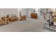 Large living room featuring neutral walls, a piano, and workout equipment at 3400 Secretariat Way, Raleigh, NC 27614