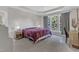 Cozy main bedroom with tray ceiling, large window, and plush carpeting at 3400 Secretariat Way, Raleigh, NC 27614