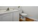 Bathroom featuring vanity, toilet, and wood flooring at 353 Spearhead Pl, Clayton, NC 27520
