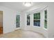 Breakfast nook featuring bay windows and a view to the backyard at 353 Spearhead Pl, Clayton, NC 27520