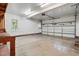 Spacious garage with window and large garage door at 353 Spearhead Pl, Clayton, NC 27520