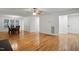 Open concept floorplan showing living room, dining area, and hallway at 353 Spearhead Pl, Clayton, NC 27520