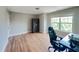 Bedroom with hardwood floors, a large window, and ample space at 3927 Wedonia Dr, Cary, NC 27519