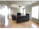 Comfortable living room with a fireplace, hardwood floors, and natural light at 3927 Wedonia Dr, Cary, NC 27519