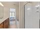 Bright bathroom with shower stall and view of the main bedroom at 401 Dyersville Dr, Morrisville, NC 27560