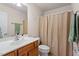 Bathroom features a single sink with a light wood vanity at 401 Dyersville Dr, Morrisville, NC 27560
