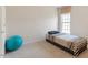 Bedroom featuring a twin bed and a large window at 401 Dyersville Dr, Morrisville, NC 27560
