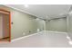 Room with modern finishes, including a fresh coat of neutral paint and modern lighting at 4030 King Charles Rd, Durham, NC 27707