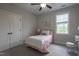 Inviting bedroom with a full-sized bed, soft lighting, and neutral decor at 441 Heritage Village Ln, Apex, NC 27502