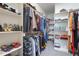 Well-organized walk-in closet with shelves and rods, providing ample storage space at 441 Heritage Village Ln, Apex, NC 27502